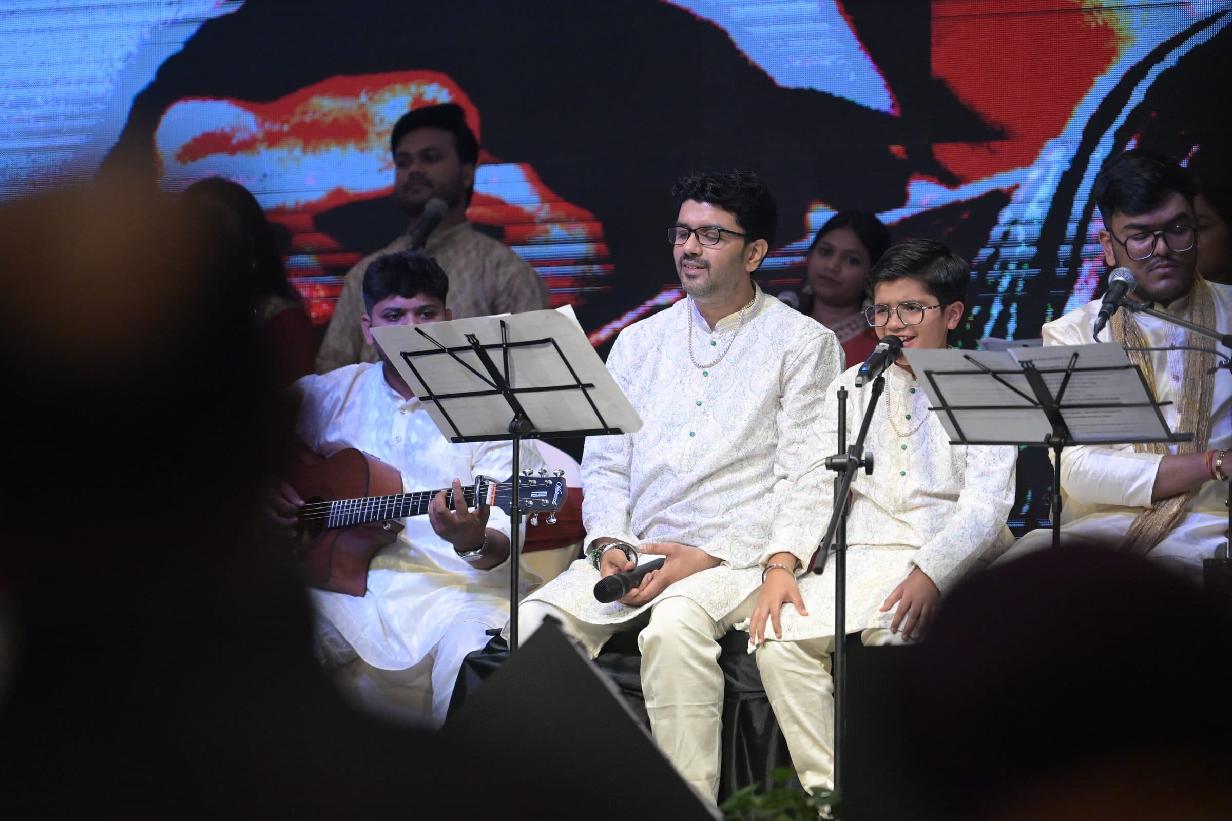 Manuj and Adhyatma Sharma performing with the ensemble