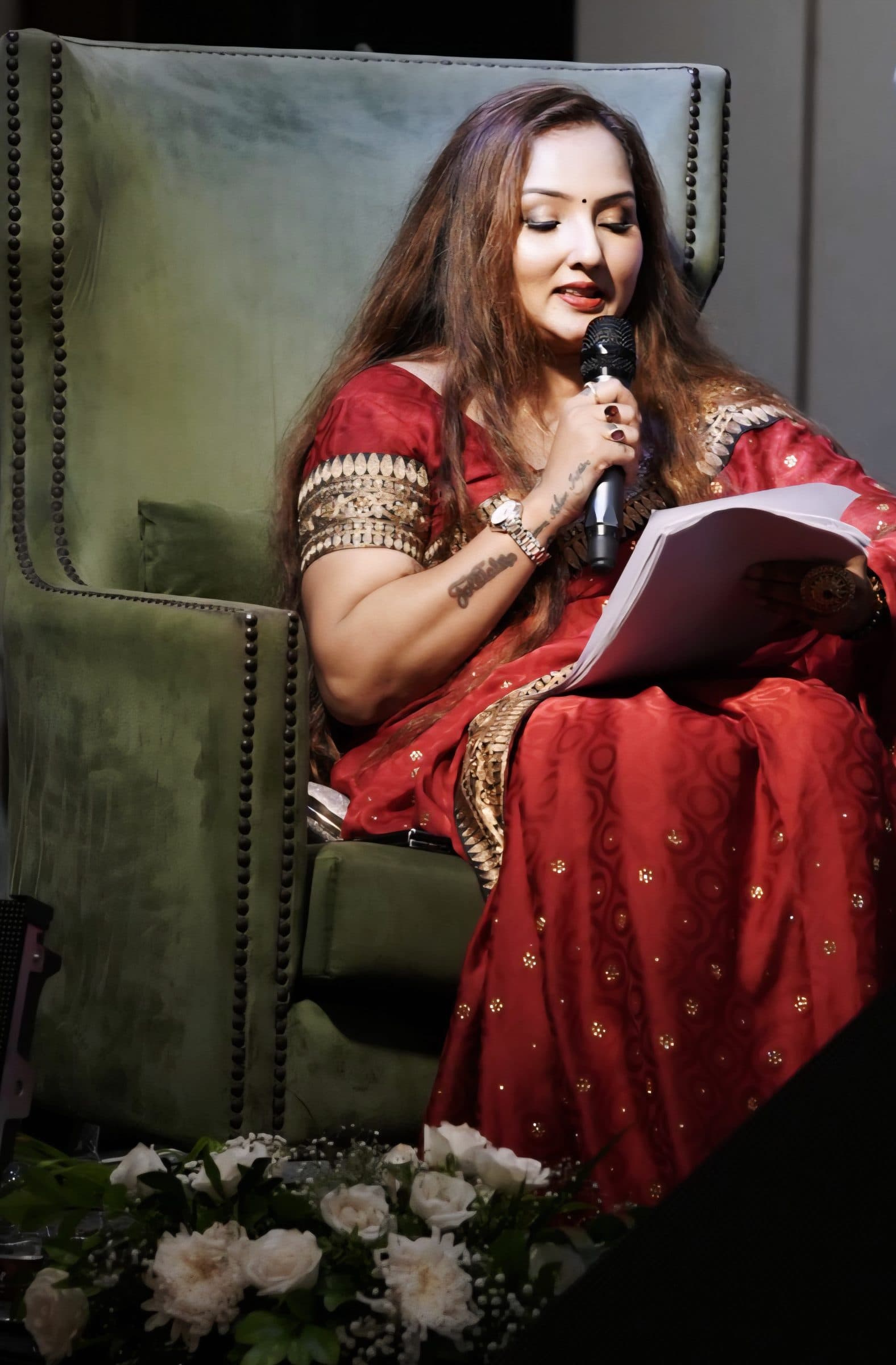 Raj Smriti speaking to the audience